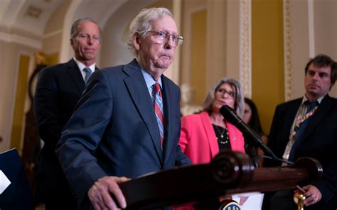 Senate GOP leader McConnell briefly leaves news conference after freezing up midsentence
